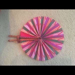 Beautiful leather and cloth folding fan.